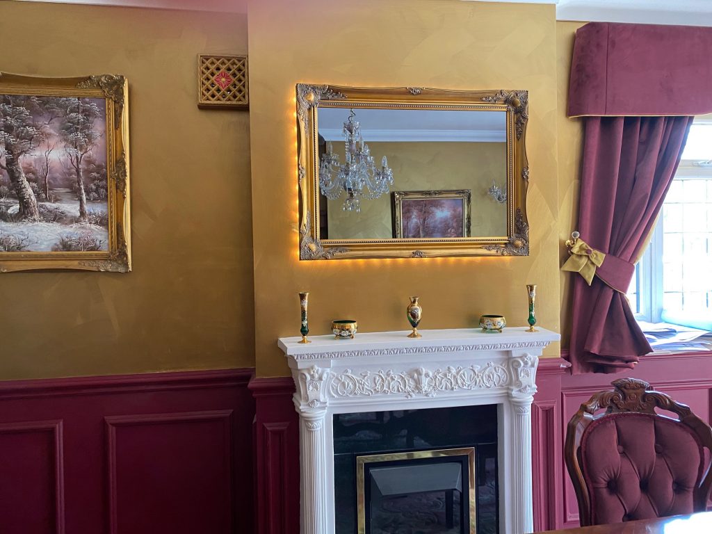 Beautiful 43″ TV in swept frame mirror tv