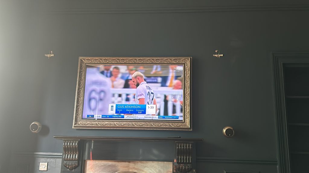 R Drummond - 50 Inch Samsung Qled Mirror TV with the TV on
